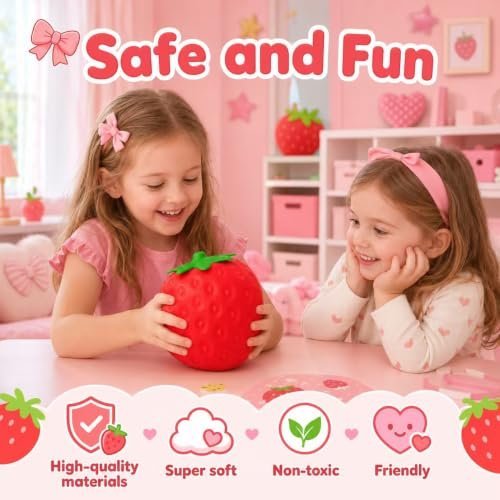 Giant jumbo strawberry squishy squeeze toy on a desk — Image 2 of 10