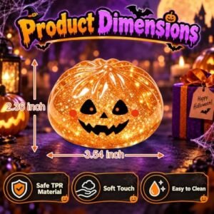 Orange Holloweee squishy dumpling toy with spooky face prints — Image 1 of 7