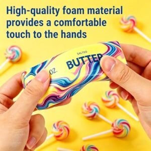Two slow rising butter squishy toys squeezed in hand — Image 3 of 11