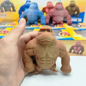 Squishy animal pinch toy with music resting on a desk — Image 1 of 6