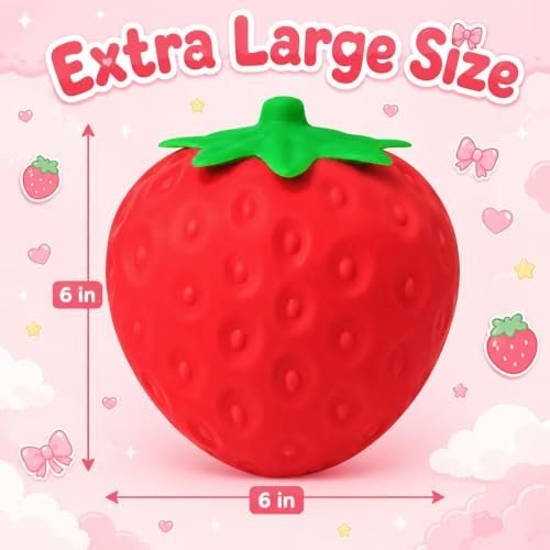 Giant jumbo strawberry squishy squeeze toy on a desk — Image 4 of 10