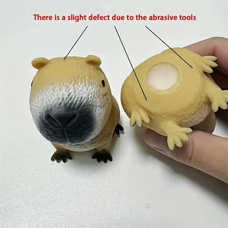 Soft capybara squishy toy squeezed in a hand — Image 6 of 7